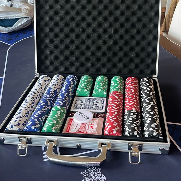 500pcs poker chip set with 2 sets of 52 deck cards including the jokers.